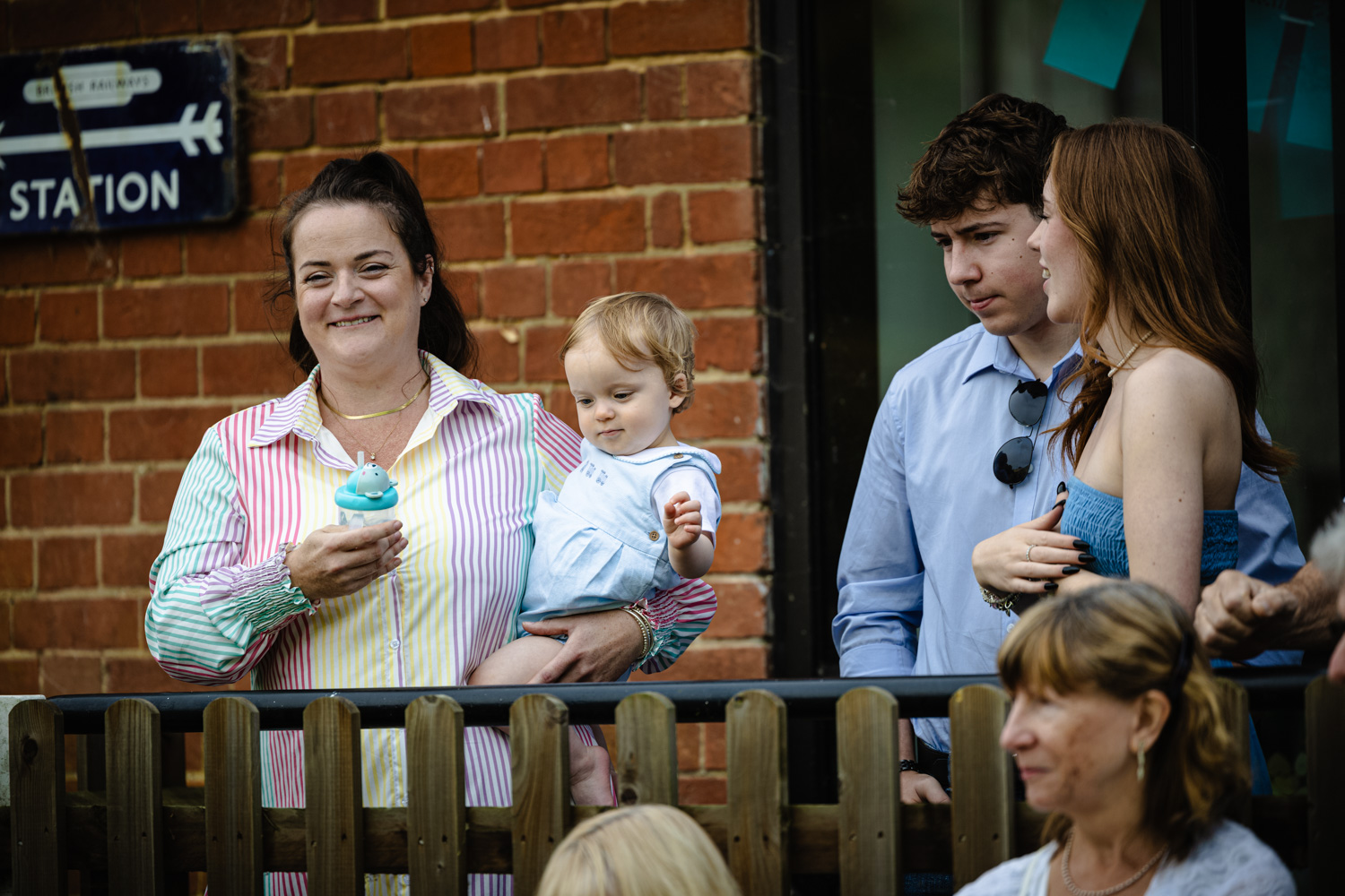 Deb Reed Celebrant Colchester Essex, Sebastian being held by his Mum at Sebastian's naming ceremony.