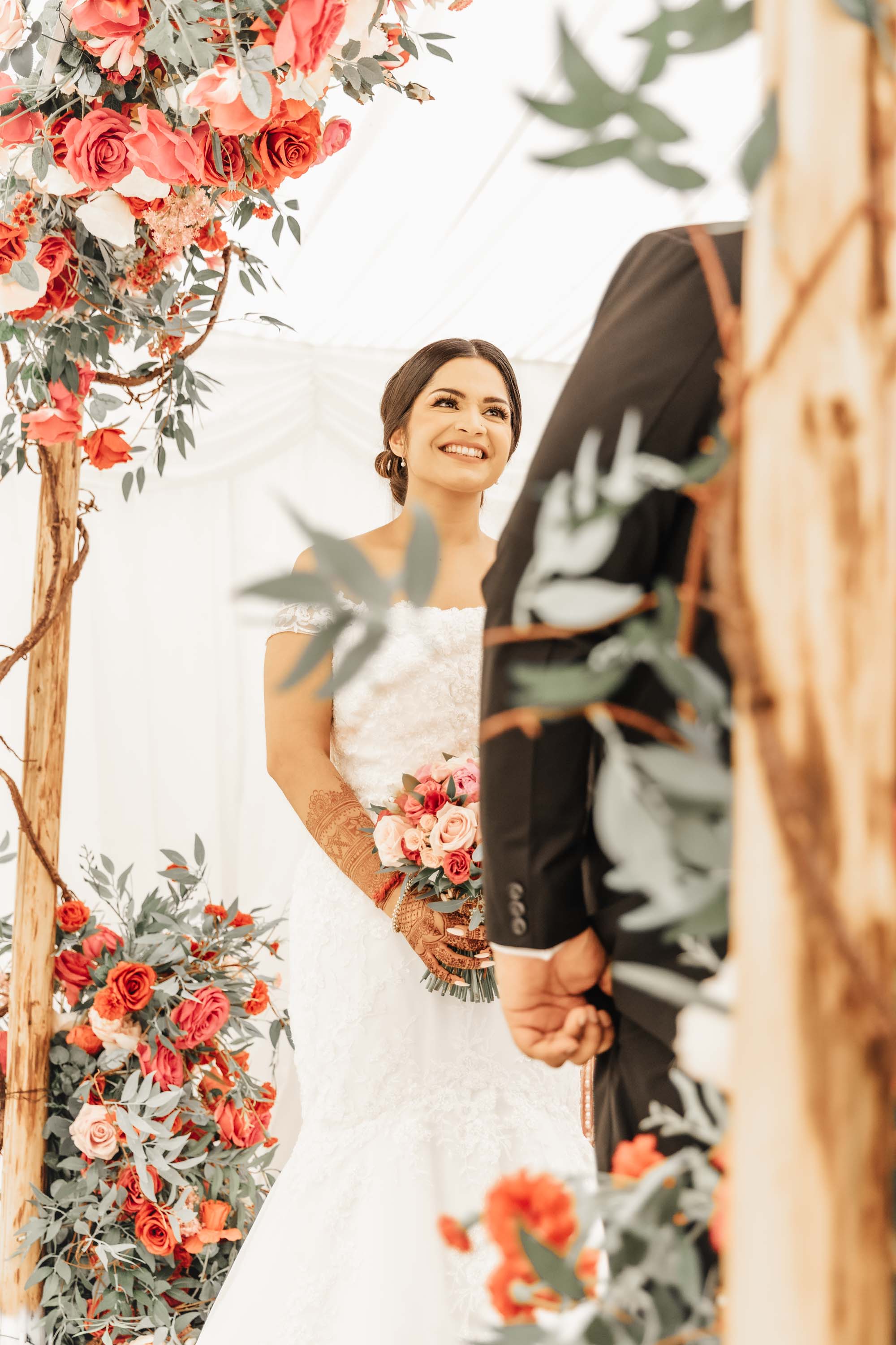 Deb Reed Celebrant Colchester Essex, showing the bride smiling at Selena and Jason's wedding.